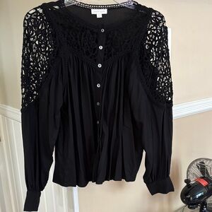 Black Crochet Sleeve blouse. Smoke free pet free home. Looks great on!! Classy!